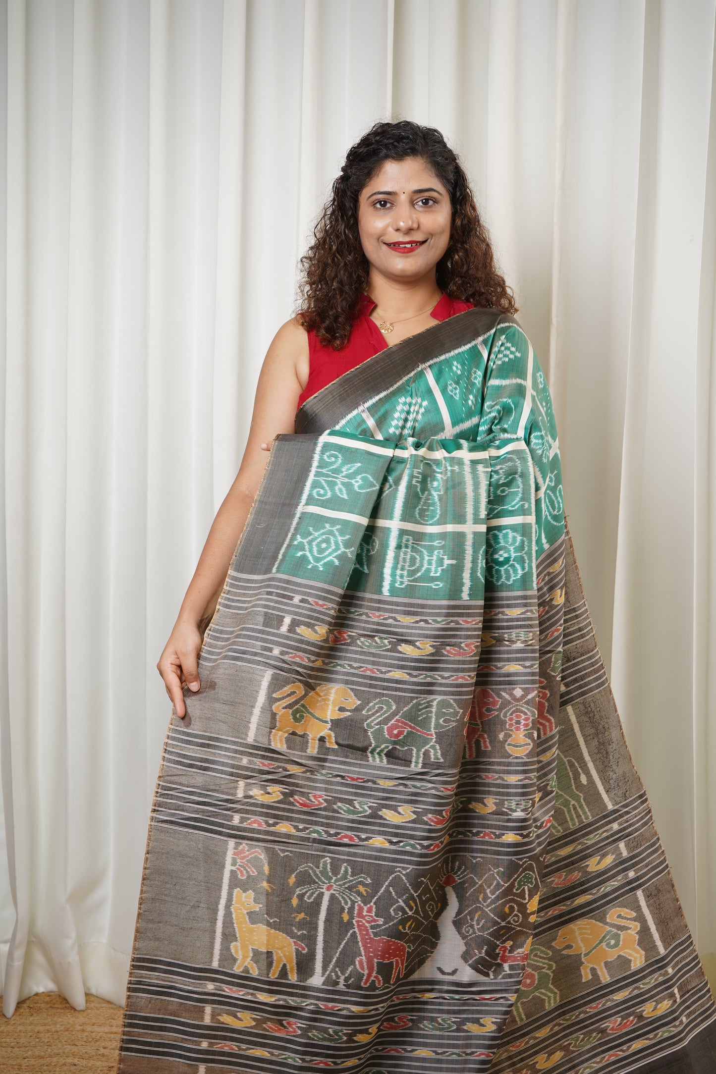 Nabakothi Khandua Ikkat Silk Saree: Dual tone english Green