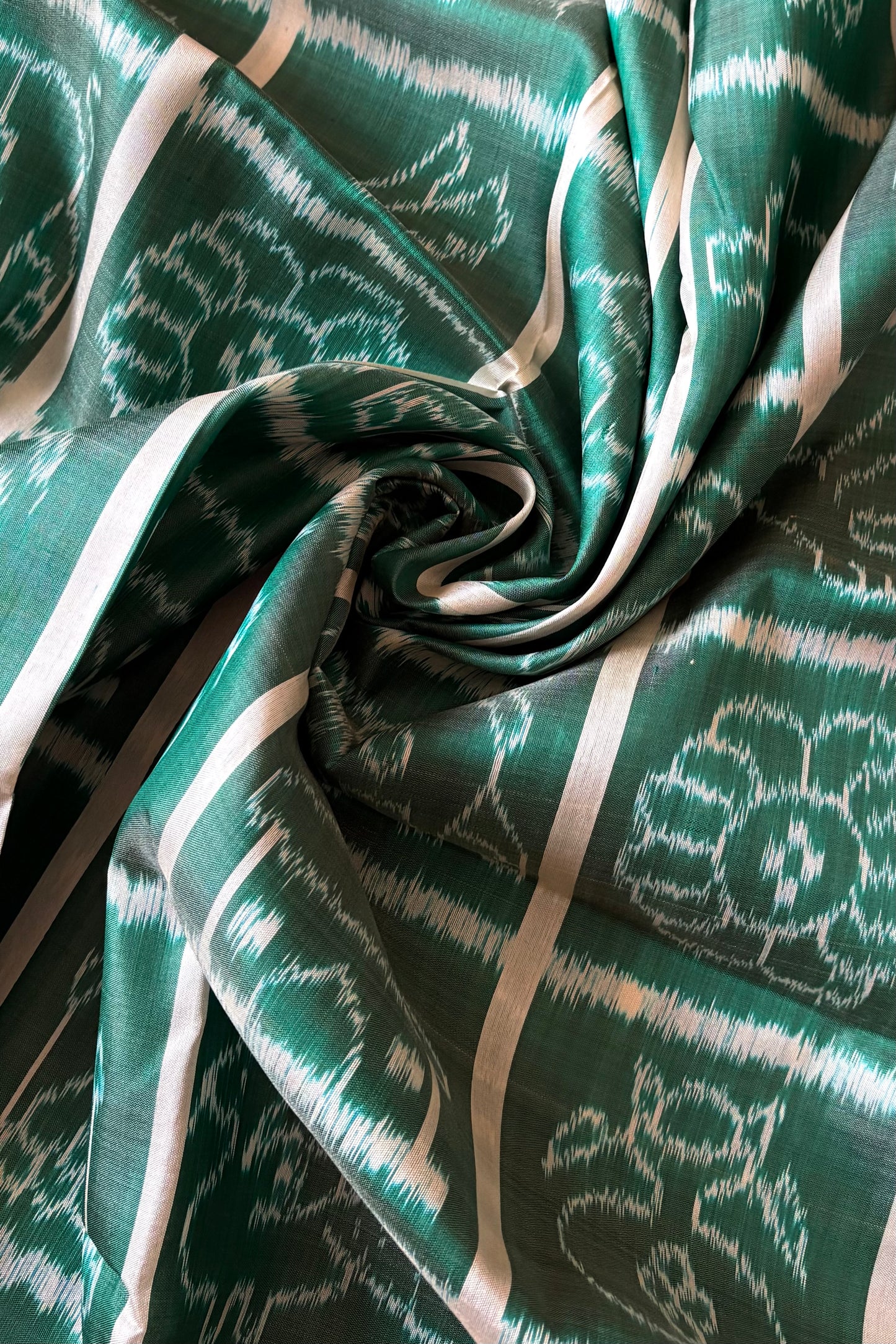 Nabakothi Khandua Ikkat Silk Saree: Dual tone english Green