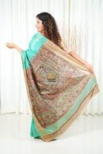 Load image into Gallery viewer, Hand Painted Madhubani Ghicha Tussar Silk Palla Slub Saree- Sea Green
