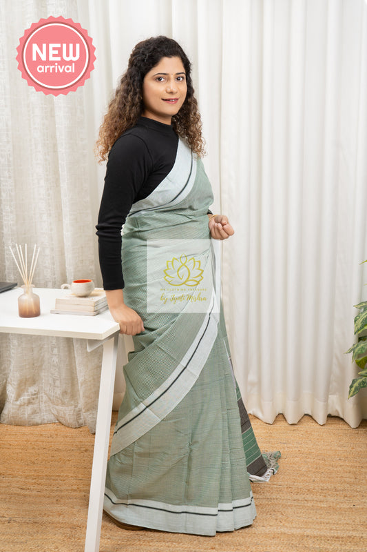 Pastel Green Patteda Anchu Cotton Saree With Light Border